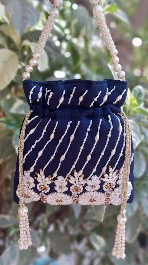 Pearl & piping work potli with pearl handle